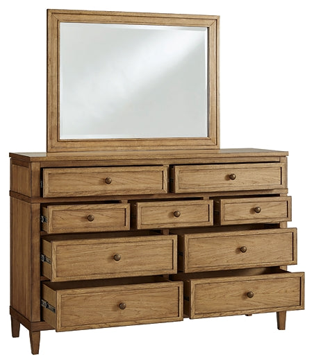 Sharlance California King Upholstered Panel Bed with Mirrored Dresser
