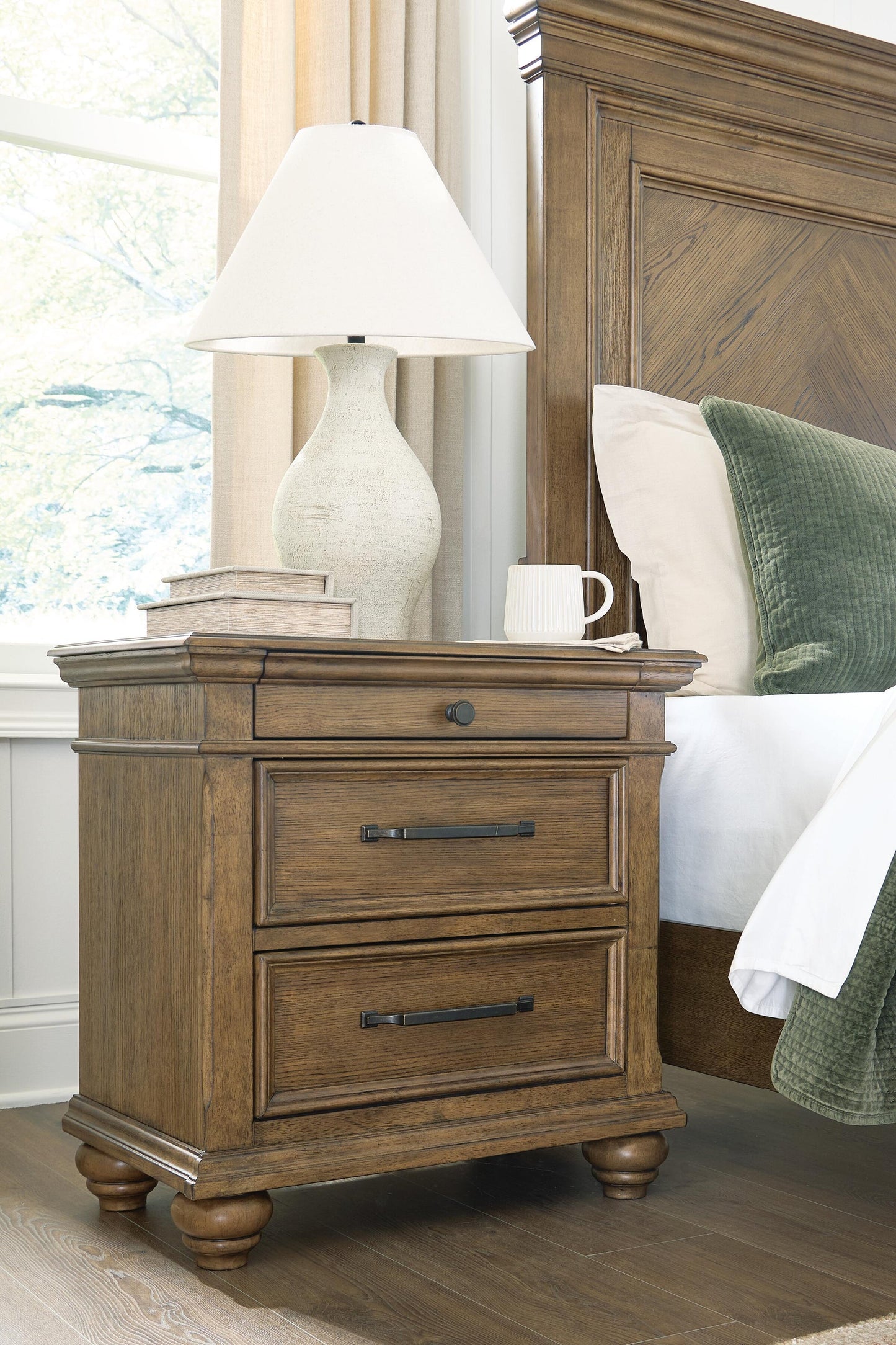 Karallin Three Drawer Night Stand